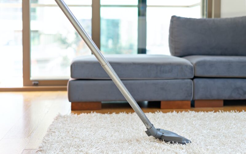 cleaning-floor-and-carpet-with-vacuum-cleaner- (1)