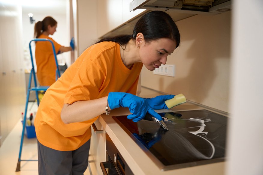 Professional kitchen stovetop cleaning during Melbourne bond clean